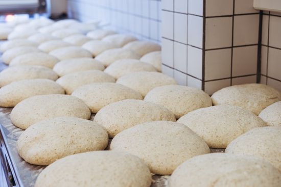 Bread dough set out to rise, illustrating the parable of the leaven