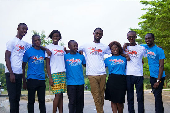 A group of Adventist youth with their arms around each other