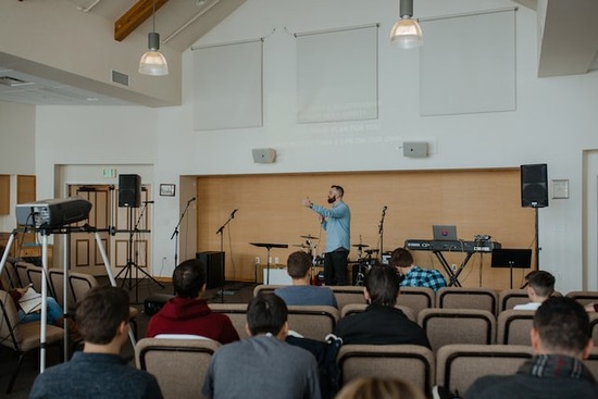 Pastor preaching sermon A pastor preaching a sermon and nurturing the local church members