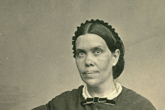 A photo of Ellen White speaking at a podium at the 1901 General Conference session.