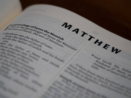 The first page of the gospel of Matthew Close-up of the first page of the Book of Matthew.