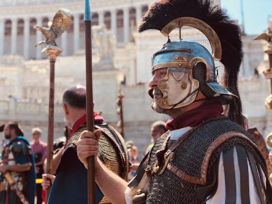 Roman soldiers standing by the Colosseum