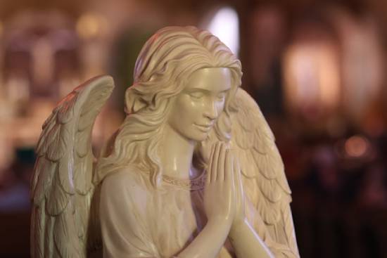 A statue of a praying angel