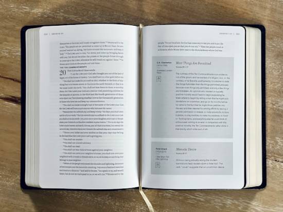 Bible open to the Ten Commandments A study Bible lies open to Exodus 20, showing the 10 Commandments.