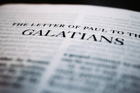 Text that reads The Letter of Paul to the Galatians A close-up of a page in the Bible titled
